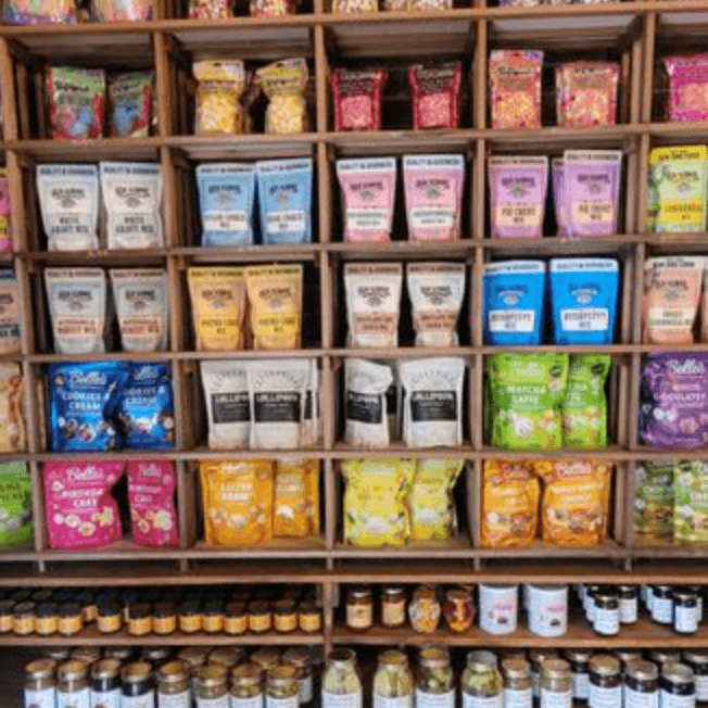 Colorful grocery products on the Lollipops market shelves