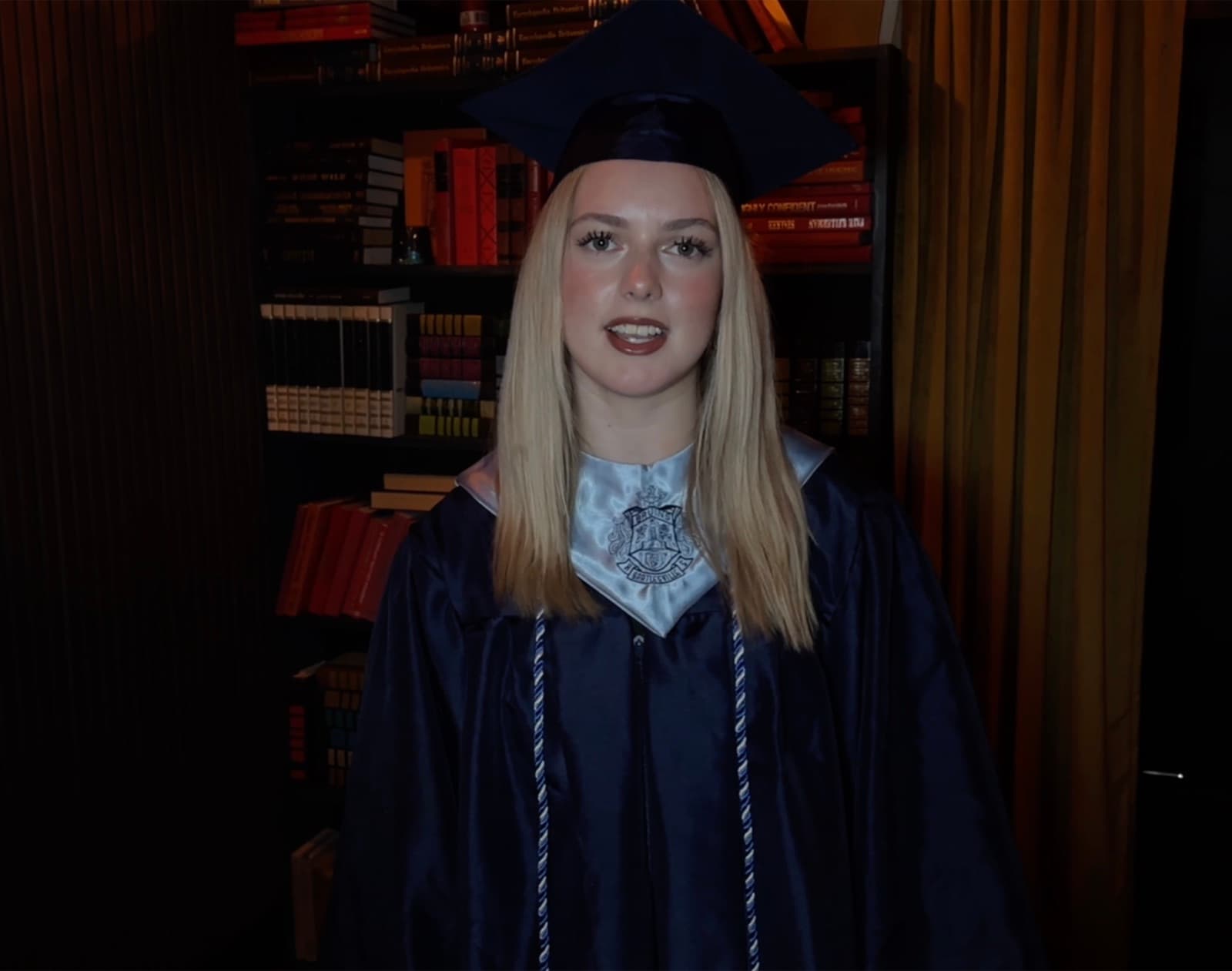 Emileigh Dancer in her graduation cap and gown